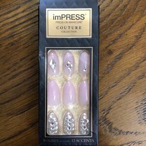 New Impress press on nails. Some pink & some gold.  Rhinestones on accent nails